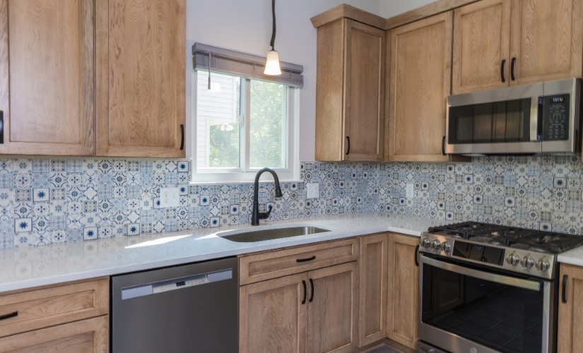 A Vibrant Kitchen Transformation: New Cabinets and Colorful Backsplash Kitchen near Ann Arbor Michigan